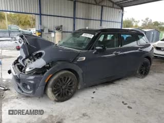 ✅ 2017 MINI Clubman Cooper S • VIN: WMWLN9C31H2E50152 • Lot: 90097225. Wystawiony na Copart z przebiegiem 92 135 mil. Bezpłatny archiwum sprzedaży aukcyjnych z USA i szczegółowy raport historii pojazdu na DreamBid. Zdjęcie 1.