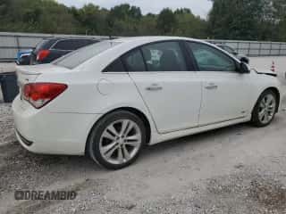 2014 Chevrolet Cruze LTZ z VIN 1G1PG5SB1E7305519, wystawiony jako Copart lot #86134945 z przebiegiem 184 249 mil mil oraz Szkoda całkowita • Salvage title. Historia ofert i sprzedaży dostępna na DreamBid. Obrazek 3.