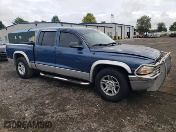 2003 Dodge Dakota SLT с VIN 1D7HL48X93S367092, выставлен на аукционе Copart как лот 71961274 с пробегом 160 709 миль миль и Списание • Salvage title. История ставок и продаж доступна на DreamBid. Изображение 4.