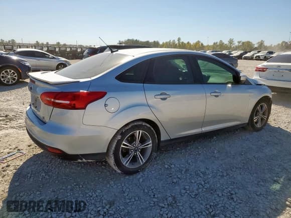 ✅ 2018 Ford Focus SE • VIN: 1FADP3FE1JL222988 • Лот: 92448775. Опубликован ранее на Copart с пробегом 74 090 миль. Бесплатный доступ к архиву аукционных продаж из США и подробный отчёт об истории автомобиля на DreamBid. Изображение 3.