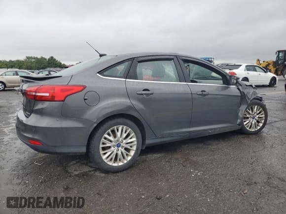✅ 2017 Ford Focus Titanium • VIN: 1FADP3J28HL207668 • Лот: 66586844. Опубликован ранее на Copart с пробегом 55 975 миль. Бесплатный доступ к архиву аукционных продаж из США и подробный отчёт об истории автомобиля на DreamBid. Изображение 3.