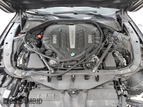 ✅ 2013 BMW 7 Series 750i • VIN: WBAYA8C56DC996704 • Лот: 64466705. Опубликован ранее на Copart с пробегом 102 278 миль. Бесплатный доступ к архиву аукционных продаж из США и подробный отчёт об истории автомобиля на DreamBid. Изображение 11.