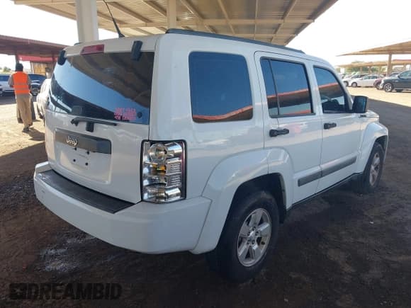✅ 2012 Jeep Liberty Sport Latitude • VIN: 1C4PJLAK7CW105679 • Lot: 43477382. Listed on IAAI with 213,765 mi. Free auction sales archive from the USA and detailed vehicle history report at DreamBid. Image 4.