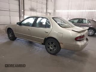 ✅ 1997 Nissan Altima XE • VIN: 1N4BU31D8VC145945 • Lot: 42547605. Listed on IAAI with 253,242 mi. Free auction sales archive from the USA and detailed vehicle history report at DreamBid. Image 3.