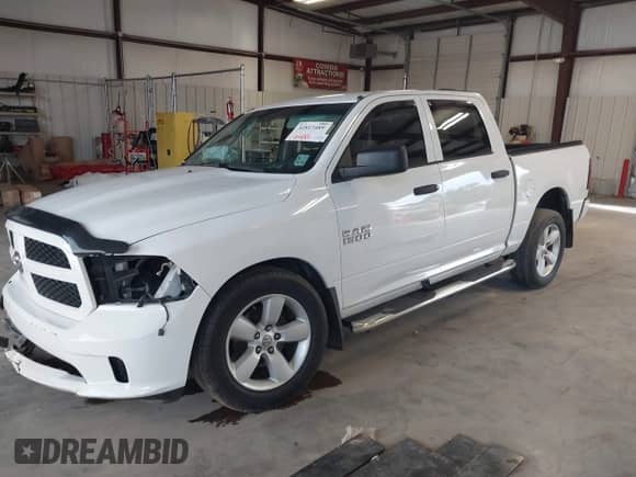 2014 Ram 1500 Tradesman z VIN 1C6RR6KG3ES480709, wystawiony jako IAAI lot #42817489 z przebiegiem 170 425 mil mil oraz . Historia ofert i sprzedaży dostępna na DreamBid. Obrazek 23.
