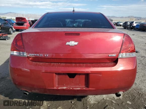 ✅ 2014 Chevrolet Impala LT • VIN: 2G1WB5E30E1183232 • Lot: 86183845. Wystawiony na Copart z przebiegiem 184 866 mil. Bezpłatny archiwum sprzedaży aukcyjnych z USA i szczegółowy raport historii pojazdu na DreamBid. Zdjęcie 6.