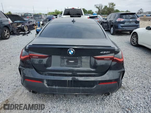✅ 2022 BMW 4 Series 430i • VIN: WBA53AP08NCJ06319 • Lot: 50144015. Wystawiony na Copart z przebiegiem 17 935 mil. Bezpłatny archiwum sprzedaży aukcyjnych z USA i szczegółowy raport historii pojazdu na DreamBid. Zdjęcie 6.