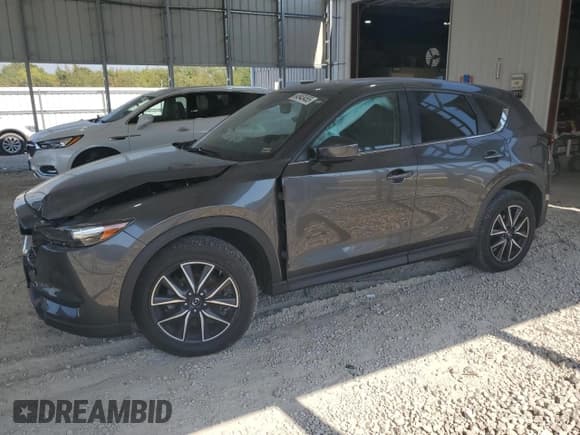 ✅ 2018 Mazda CX-5 Touring • VIN: JM3KFBCM0J0447213 • Лот: 84943455. Опубликован ранее на Copart с пробегом 105 448 миль. Бесплатный доступ к архиву аукционных продаж из США и подробный отчёт об истории автомобиля на DreamBid. Изображение 1.