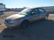 ✅ 2004 Ford Taurus LX • VIN: 1FAFP52U94G106307 • Lot: 43338680. Wystawiony na IAAI z przebiegiem 169 280 mil. Bezpłatny archiwum sprzedaży aukcyjnych z USA i szczegółowy raport historii pojazdu na DreamBid. Zdjęcie 2.