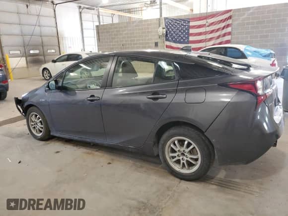 2021 Toyota Prius L Eco с VIN JTDKAMFU5M3143781, выставлен на аукционе Copart как лот 81028565 с пробегом 52 355 миль миль и Списание • Salvage title. История ставок и продаж доступна на DreamBid. Изображение 2.