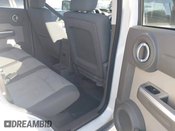 2008 Dodge Nitro SLT z VIN 1D8GT58K28W270723, wystawiony jako IAAI lot #42750938 z przebiegiem 167 668 mil mil oraz . Historia ofert i sprzedaży dostępna na DreamBid. Obrazek 8.