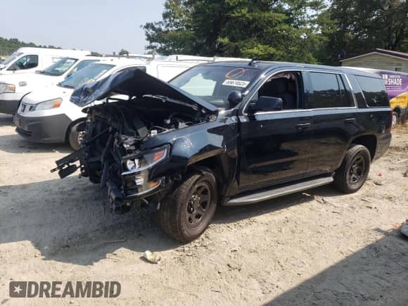 2019 Chevrolet Tahoe Commercial with VIN 1GNLCDECXKR241469, listed as a Copart auction lot 65674525 with Not provided miles and Salvage title. Bid and sale history available at DreamBid. Image 1.