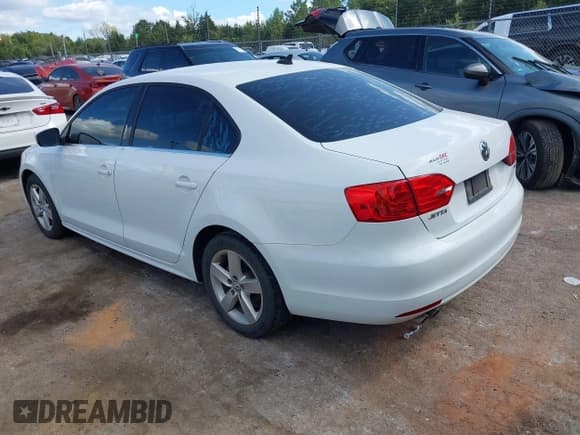 ✅ 2014 Volkswagen Jetta TDI • VIN: 3VWLL7AJ0EM409900 • Lot: 43272153. Listed on IAAI with 159,627 mi. Free auction sales archive from the USA and detailed vehicle history report at DreamBid. Image 3.