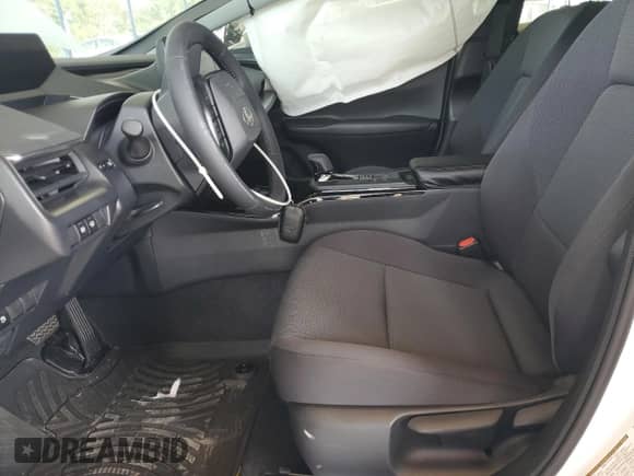 2025 Toyota Prius LE с VIN JTDACAAU5S3052468, выставлен на аукционе Copart как лот 81701345 с пробегом Не указан миль и Списание • Salvage title. История ставок и продаж доступна на DreamBid. Изображение 7.