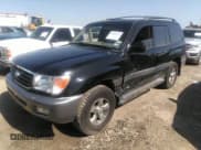 ✅ 2001 Toyota Land Cruiser • VIN: JTEHT05J512016563 • Lot: 41868193. Listed on IAAI with 247,653 mi. Free auction sales archive from the USA and detailed vehicle history report at DreamBid. Image 2.