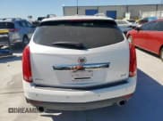 ✅ 2013 Cadillac SRX Performance Collection • VIN: 3GYFNDE36DS593975 • Lot: 86165745. Listed on Copart with 122,083 mi. Free auction sales archive from the USA and detailed vehicle history report at DreamBid. Image 6.
