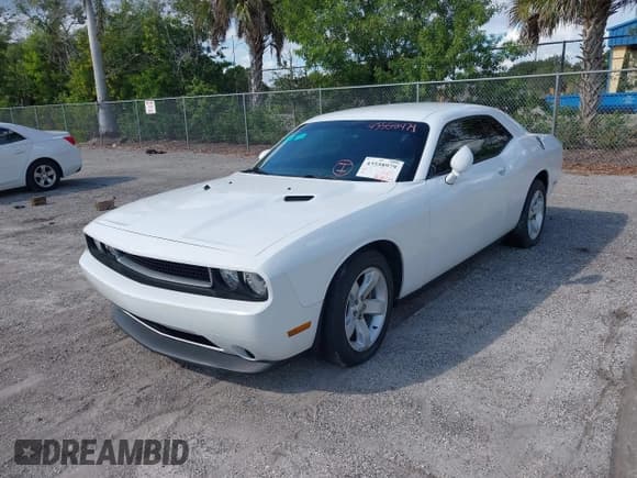 ✅ 2013 Dodge Challenger SXT • VIN: 2C3CDYAG5DH693813 • Lot: 43558979. Listed on IAAI with 188,863 mi. Free auction sales archive from the USA and detailed vehicle history report at DreamBid. Image 2.