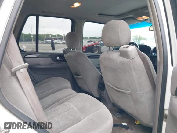 ✅ 2006 GMC Envoy SLE • VIN: 1GKDT13S762251921 • Lot: 42460295. Listed on IAAI with 206,063 mi. Free auction sales archive from the USA and detailed vehicle history report at DreamBid. Image 8.