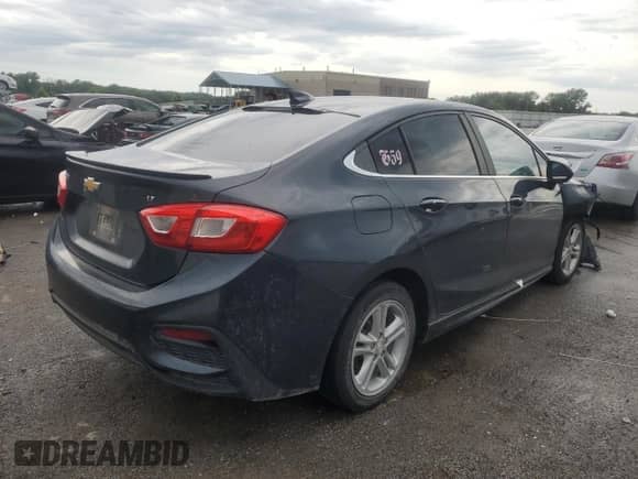 2017 Chevrolet Cruze LT с VIN 1G1BE5SM5H7133128, выставлен на аукционе Copart как лот 65519665 с пробегом 275 516 миль миль и Списание • Salvage title. История ставок и продаж доступна на DreamBid. Изображение 3.