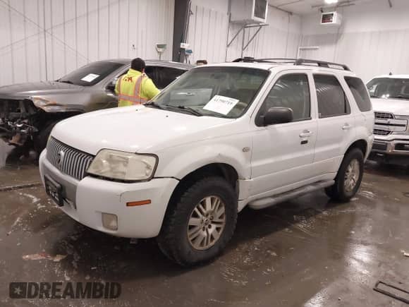 2006 Mercury Mariner Luxury с VIN 4M2YU57116DJ03832, выставлен на аукционе IAAI как лот 41790719 с пробегом 161 978 миль миль и . История ставок и продаж доступна на DreamBid. Изображение 21.
