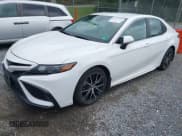 ✅ 2022 Toyota Camry Hybrid SE • VIN: 4T1G31AK9NU038141 • Лот: 42871003. Опубликован ранее на IAAI с пробегом 31 918 миль. Бесплатный доступ к архиву аукционных продаж из США и подробный отчёт об истории автомобиля на DreamBid. Изображение 2.