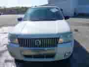 2005 Mercury Mariner Luxury z VIN 4M2CU56165DJ21267, wystawiony jako IAAI lot #41934003 z przebiegiem Nie podano mil oraz . Historia ofert i sprzedaży dostępna na DreamBid. Obrazek 11.