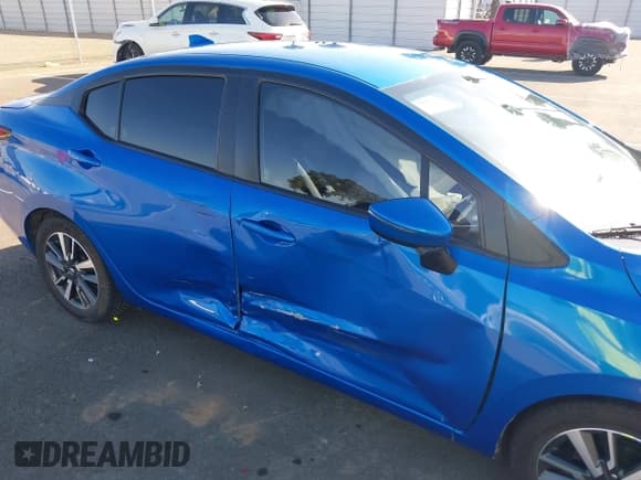 ✅ 2021 Nissan Versa SV • VIN: 3N1CN8EV8ML809002 • Lot: 42143135. Listed on IAAI with 72,020 mi. Free auction sales archive from the USA and detailed vehicle history report at DreamBid. Image 6.