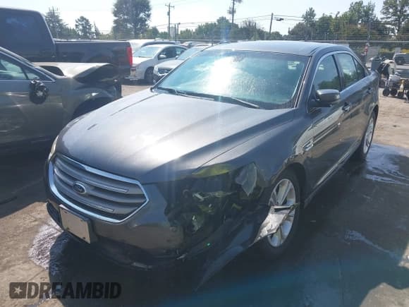 ✅ 2015 Ford Taurus SEL • VIN: 1FAHP2E88FG179306 • Лот: 43262362. Опубликован ранее на IAAI с пробегом 124 164 миль. Бесплатный доступ к архиву аукционных продаж из США и подробный отчёт об истории автомобиля на DreamBid. Изображение 2.
