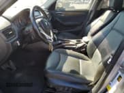 ✅ 2013 BMW X1 28i • VIN: WBAVM1C57DVW45810 • Лот: 68126824. Опубликован ранее на Copart с пробегом 149 237 миль. Бесплатный доступ к архиву аукционных продаж из США и подробный отчёт об истории автомобиля на DreamBid. Изображение 7.