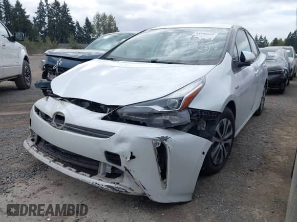 2022 Toyota Prius LE with VIN JTDL9MFU8N3037825, listed as a IAAI auction lot 43398992 with 189,228 mi miles and . Bid and sale history available at DreamBid. Image 2.