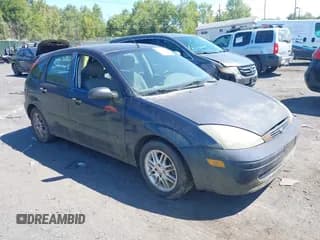 ✅ 2003 Ford Focus ZX5 • VIN: 3FAHP37323R184318 • Lot: 43119975. Listed on IAAI with 157,000 mi. Free auction sales archive from the USA and detailed vehicle history report at DreamBid. Image 1.