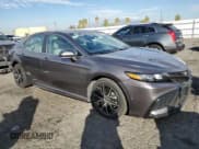 ✅ 2023 Toyota Camry SE Nightshade • VIN: 4T1G11AK8PU744526 • Лот: 82362485. Опубликован ранее на Copart с пробегом 91 657 миль. Бесплатный доступ к архиву аукционных продаж из США и подробный отчёт об истории автомобиля на DreamBid. Изображение 4.