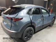 ✅ 2022 Mazda CX-30 S Carbon Edition • VIN: 3MVDMBCL8NM447234 • Lot: 42511600. Listed on IAAI with 51,926 mi. Free auction sales archive from the USA and detailed vehicle history report at DreamBid. Image 6.