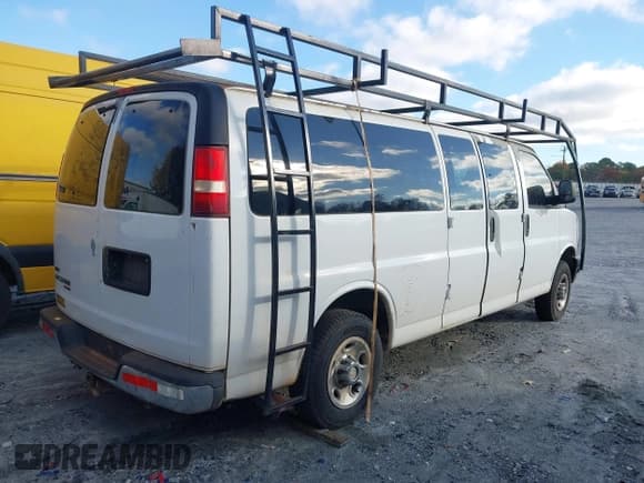 ✅ 2012 Chevrolet Express Passenger 1LT • VIN: 1GAZG1FG9C1100070 • Lot: 43639948. Listed on IAAI with 167,715 mi. Free auction sales archive from the USA and detailed vehicle history report at DreamBid. Image 4.