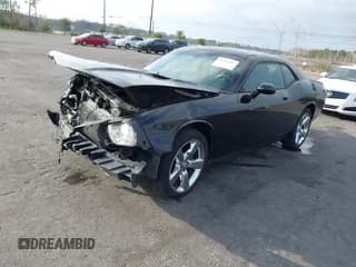 ✅ 2010 Dodge Challenger SE • VIN: 2B3CJ4DV3AH323593 • Lot: 41597617. Wystawiony na IAAI z przebiegiem 229 833 mil. Bezpłatny archiwum sprzedaży aukcyjnych z USA i szczegółowy raport historii pojazdu na DreamBid. Zdjęcie 2.