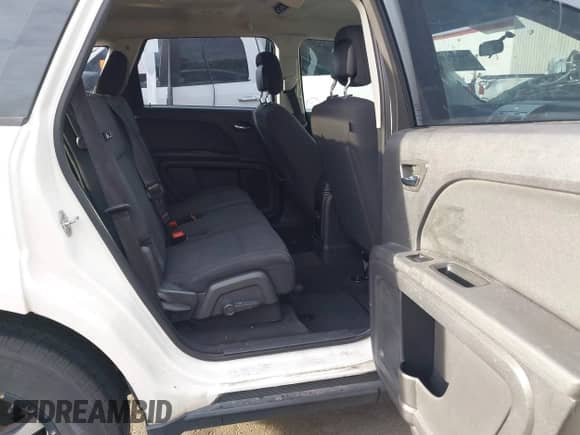 2010 Dodge Journey SE z VIN 3D4PG4FB7AT198982, wystawiony jako IAAI lot #43435599 z przebiegiem 202 565 mil mil oraz . Historia ofert i sprzedaży dostępna na DreamBid. Obrazek 8.