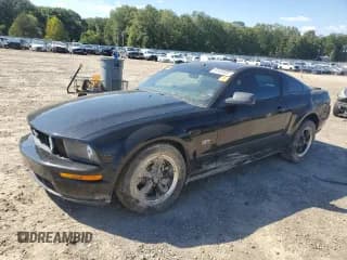 ✅ 2006 Ford Mustang GT Deluxe • VIN: 1ZVHT82H765197575 • Lot: 84469385. Listed on Copart with 113,974 mi. Free auction sales archive from the USA and detailed vehicle history report at DreamBid. Image 1.