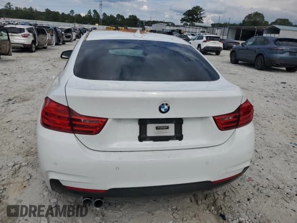 ✅ 2015 BMW 4 Series 428i • VIN: WBA4A5C57FG052581 • Lot: 84033205. Listed on Copart with 76,638 mi. Free auction sales archive from the USA and detailed vehicle history report at DreamBid. Image 6.