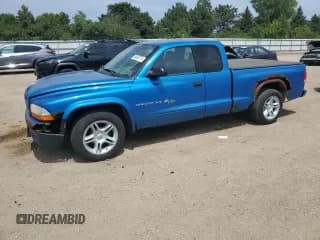 ✅ 1998 Dodge Dakota Sport • VIN: 1B7GL22Z2WS697228 • Lot: 64366775. Listed on Copart with 196,830 mi. Free auction sales archive from the USA and detailed vehicle history report at DreamBid. Image 1.