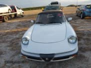 ✅ 1989 Alfa Romeo Spider • VIN: ZARBA5583K1066434 • Lot: 40554529. Listed on IAAI with 49,263 mi. Free auction sales archive from the USA and detailed vehicle history report at DreamBid. Image 12.