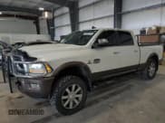 ✅ 2018 Ram 2500 Limited • VIN: 3C6UR5GLXJG209822 • Lot: 66546735. Listed on Copart with 207,154 mi. Free auction sales archive from the USA and detailed vehicle history report at DreamBid. Image 1.