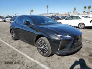 ✅ 2023 Lexus RZ 450e Premium • VIN: JTJAAAAB3PA013849 • Lot: 81664514. Wystawiony na Copart z przebiegiem 7 914 mil. Bezpłatny archiwum sprzedaży aukcyjnych z USA i szczegółowy raport historii pojazdu na DreamBid. Zdjęcie 4.