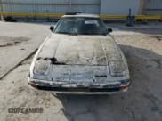 ✅ 1985 Mazda RX-7 • VIN: JM1FB3322F0860235 • Lot: 77674594. Wystawiony na Copart z przebiegiem 112 945 mil. Bezpłatny archiwum sprzedaży aukcyjnych z USA i szczegółowy raport historii pojazdu na DreamBid. Zdjęcie 5.