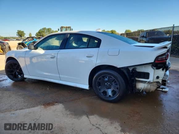 2023 Dodge Charger GT с VIN 2C3CDXHG9PH554496, выставлен на аукционе Copart как лот 85870135 с пробегом 84 818 миль миль и Чистый • Clean title. История ставок и продаж доступна на DreamBid. Изображение 2.