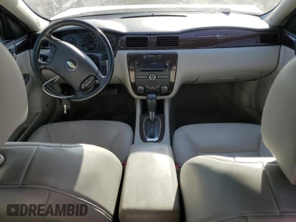 ✅ 2014 Chevrolet Impala LTZ • VIN: 2G1WC5E30E1101965 • Лот: 73232634. Опубликован ранее на Copart с пробегом 129 660 миль. Бесплатный доступ к архиву аукционных продаж из США и подробный отчёт об истории автомобиля на DreamBid. Изображение 8.