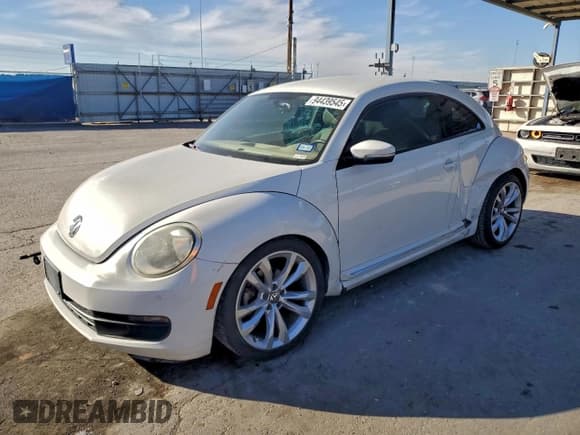 ✅ 2013 Volkswagen Beetle 2.5L • VIN: 3VWJX7AT2DM669016 • Lot: 94439545. Listed on Copart with 82,512 mi. Free auction sales archive from the USA and detailed vehicle history report at DreamBid. Image 1.