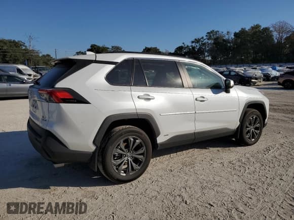 ✅ 2024 Toyota RAV4 Hybrid XLE Premium • VIN: 4T3B6RFV2RU140414 • Лот: 93538505. Опубликован ранее на Copart с пробегом 18 984 миль. Бесплатный доступ к архиву аукционных продаж из США и подробный отчёт об истории автомобиля на DreamBid. Изображение 3.