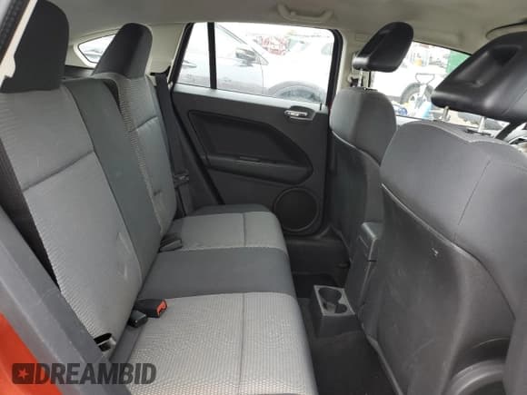 ✅ 2009 Dodge Caliber SXT • VIN: 1B3HB48A29D157571 • Лот: 71870254. Опубликован ранее на Copart с пробегом 176 514 миль. Бесплатный доступ к архиву аукционных продаж из США и подробный отчёт об истории автомобиля на DreamBid. Изображение 10.