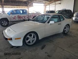 ✅ 1987 Porsche 944 • VIN: WP0AB0948HN472823 • Lot: 70503855. Listed on Copart with 142,361 mi. Free auction sales archive from the USA and detailed vehicle history report at DreamBid. Image 1.