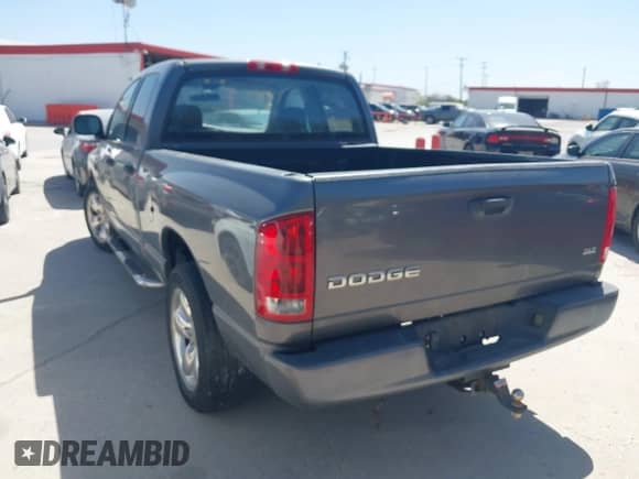 2003 Dodge 1500 ST z VIN 1D7HA18N13S360544, wystawiony jako IAAI lot #41808387 z przebiegiem 169 785 mil mil oraz . Historia ofert i sprzedaży dostępna na DreamBid. Obrazek 3.